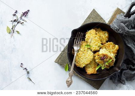 Vegan Vegetable Fritters On A Background Of Gray Stone Or Slate. Fried Vegetarian Cutlets Or Pancake