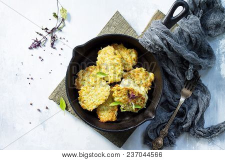 Vegan Vegetable Fritters On A Background Of Gray Stone Or Slate. Fried Vegetarian Cutlets Or Pancake