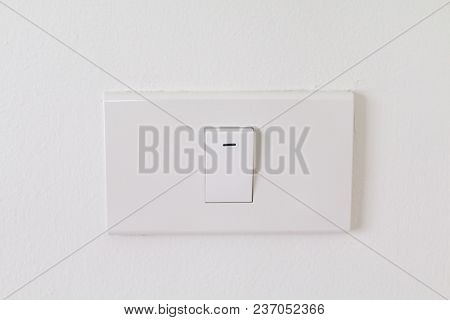 Electronic Switches With White Background, White Switches On Wall In Home, Closeup Switches Interior