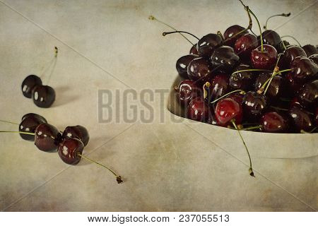 Beautiful Juicy Fresh Summer Cherries In A White Bowl On A Vintege Background