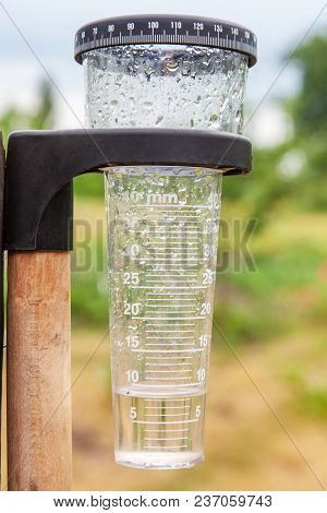 Meteorology With Rain Gauge In Garden