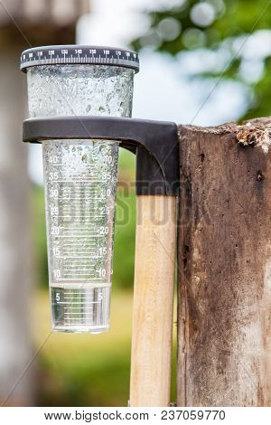 Meteorology With Rain Gauge In Garden