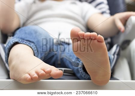 Feets Of Little Sleeping Baby Boy. Concept Of New Life.