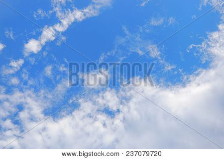 Beautiful Nature Blue Sky With Clouds, Sky Clouds Background, Cloudscape Concept. Space For Text In 