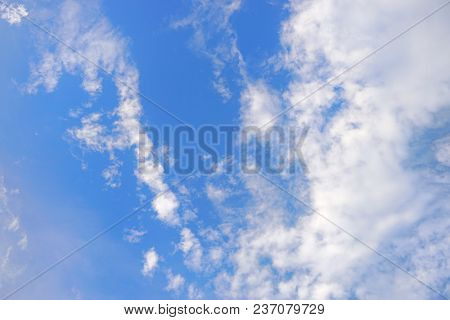 Beautiful Nature Blue Sky With Clouds, Sky Clouds Background, Cloudscape Concept. Space For Text In 