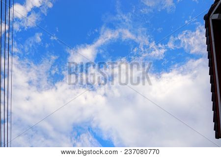 Looking Up Roof With Home On Blue Sky And Clouds, Beautiful Nature Blue Sky With Clouds, Cloudscape 