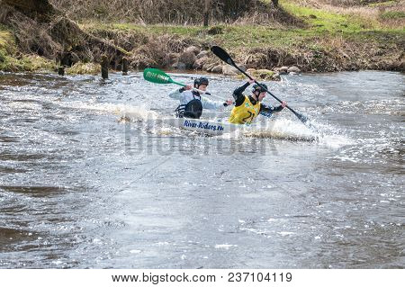 Grodno, Belarus - April, 2018: Kayak Freestyle Competition On Fast Cold Water River Strenuously Rowi