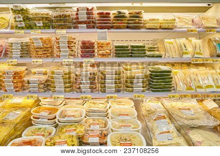 ROME, ITALY - CIRCA NOVEMBER 2017: stalls filled with food products are seen in Conad supermarket in Rome.