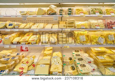 ROME, ITALY - CIRCA NOVEMBER 2017: cheese on display in Conad supermarket in Rome.