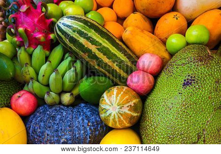 Tropical Fruit Background. Raw And Ripe Exotic Fruit Closeup Photo. Vegetarian Wallpaper. Healthy Fo
