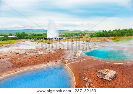 Thermal Lake Blesi And Eruption Of Strokkur Geysir, Golden Circle Route In Iceland
