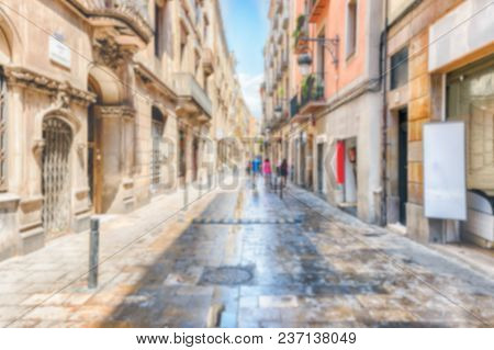 Defocused Background Of Carrer De Sant Pere Més Alt In La Ribera District Of Barcelona, Catalonia, S