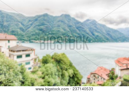 Defocused Background With Scenic Landscape Over The Lake Como, As Seen From The Town Of Bellano, Ita