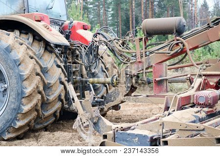 Sowing Unit, Combine Harvester, Seeder And Lorry, Dumper On The Field.