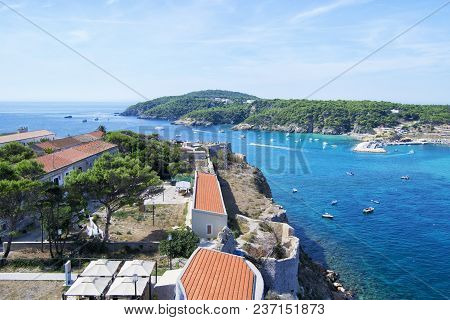 View Of Tremiti Islands With Blue Water, Boats And Clouds. Gargano. Puglia, Italy. For Nature, Trave