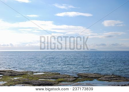 Flat Rock Coast With Limestone Ground On The Swedish Island Oland In The Baltic Sea