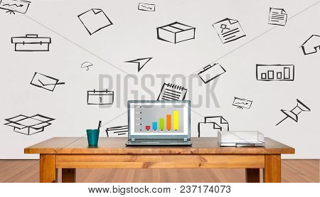 Computer On A Table And Symbols Office