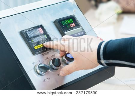 A Close-up Of The Operator The Man Presses The Button On The Control Panel With The Control Devices 