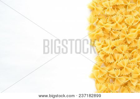 Farfalle Raw Farfallini Beautiful Laid Out Pasta With The Right, With A Side On White Isolated Backg