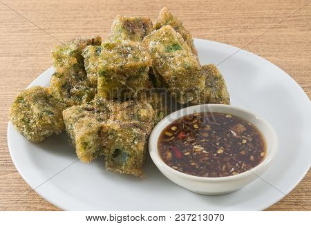 Fried Chinese Pancake Or Fried Steamed Dumpling Made Of Garlic Chives, Rice Flour And Tapioca Flour 
