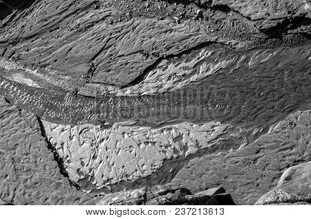 Black And White Waterfall Stream Surrounded With Rocks Canyon Bird Eye View Shot