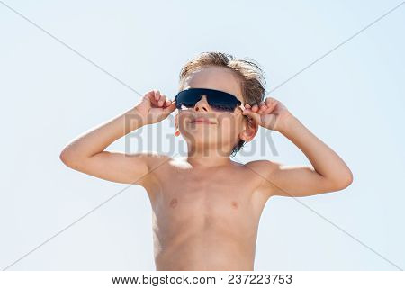 Happy Handsome Little Child In Sunglasses In Sunny Summer Day