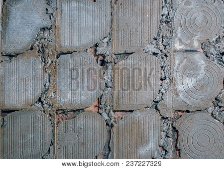 Old Wall With Traces Of Fallen Off Facing Tiles For Abstract Background
