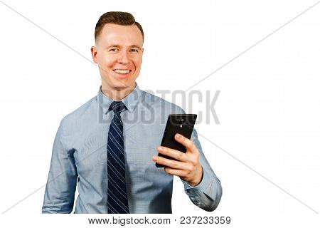 Young Businessman Dressed In Blue Shirt And Tie, Isolated On White Background