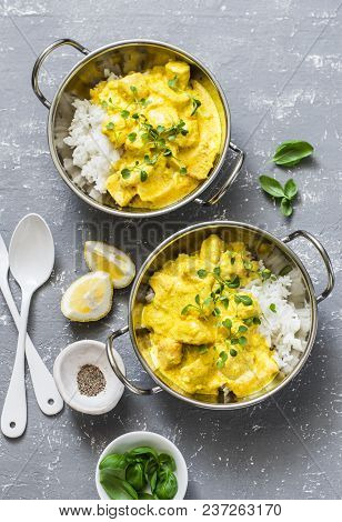 Salmon Curry And Rice In Curry Dishes On Grey Background, Top View. Indian Cusine Style. Flat Lay