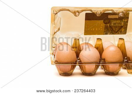 Chicken Eggs In A Box For Eggs On A White Background