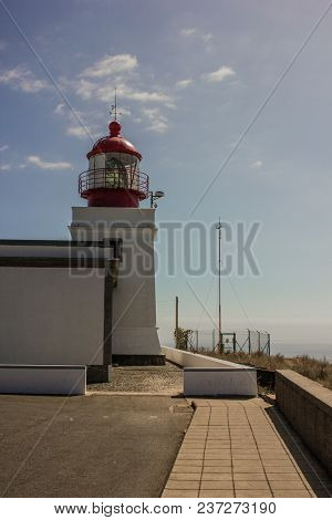 Beautiful Sea Coast In Madeira Island, Portugal. Lighthouse Ponta Do Pargo