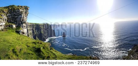 Beautiful Scenic Aerial Drone View Of Ireland Cliffs Of Moher In County Clare. Sunset Over The Cliff