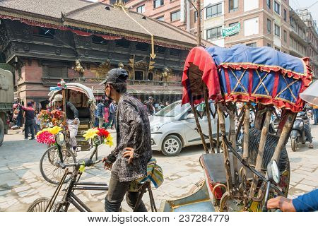 A Pedicab On Narrow Streets On March 25, 2018 In Kathmandu, Nepal.