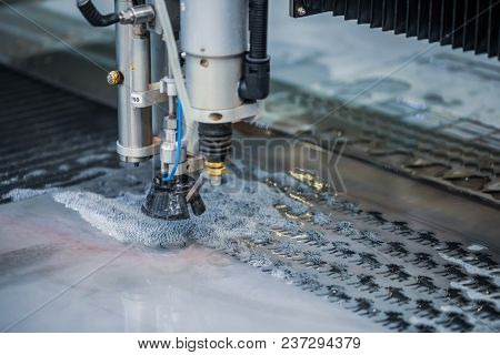 CNC water jet cutting machine modern industrial technology.
