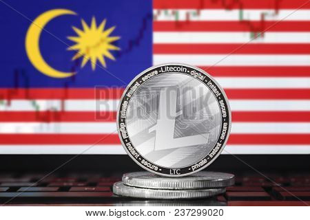 Litecoin (ltc) Cryptocurrency; Coin Litecoin On The Background Of The Flag Of Malaysia