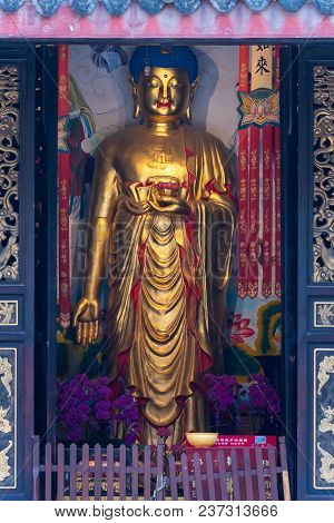 Chengdu, Sichuan Province, China - April 18, 2018 : Golden Colored Buddha In Daci Temple