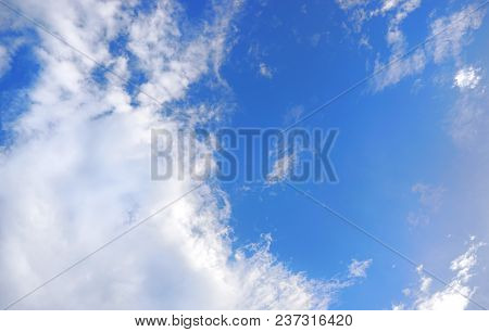 Beautiful Nature Blue Sky With Clouds, Sky Clouds Background, Cloudscape Concept. Space For Text In 