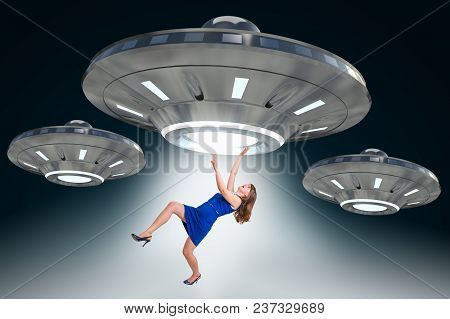 Woman Being Abducted By Ufo - Concept Of Alien Abduction