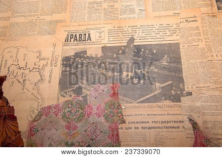 Russia, Saint Petersburg - August 18, 2017: Fragment Of An Old Wall With Ragged Wallpaper And Old Co