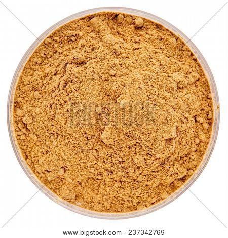 raw organic dried camu camu fruit powder (Myciara Dubia) in an isolated  Petri dish - rainforest superfruit from Peru rich in vitamin C
