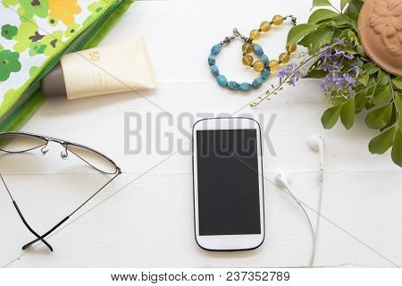 Sunscreen Cream Spf50 For Skin Face With Sunglasses In Bag And Mobile Phone Accessories For Lifestyl