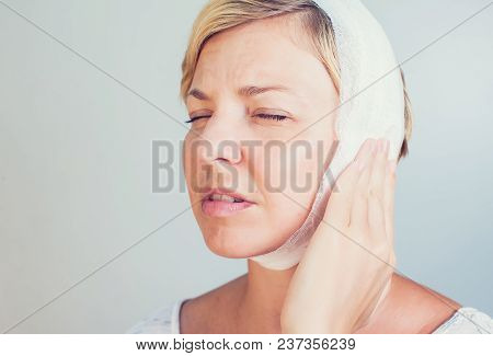 Young Female Having Ear Pain Touching Her Painful Head Earache