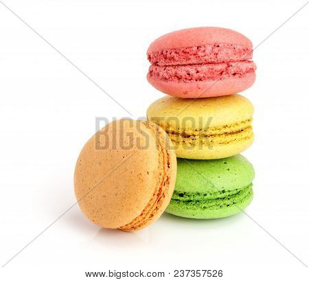 Colorful Macarons Isolated On White Background Closeup.