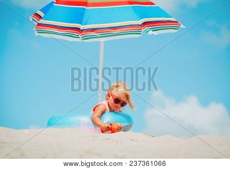 Cute Little Girl Play At Summer Tropical Beach