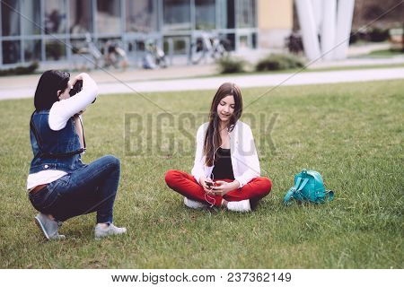 A Professional Photographer Performs His Work