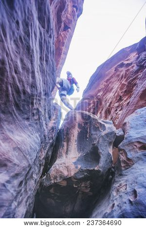 Tourist On The Rocks, Canyon Of Khazali. Wadi Rum Desert, Jordan