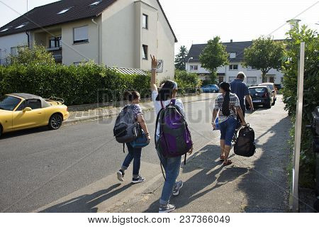 German People And Thai Travelers Walking Beside Road On Ilvesheimer Road Go To Home At Mannheim City