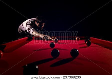 A Man With A Beard Plays A Big Billiard. Party In 12-foot Pool. Billiards In The Club Game For Men. 
