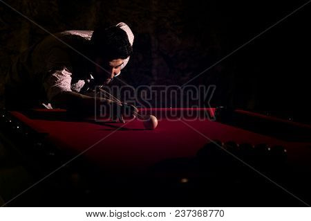 A Man With A Beard Plays A Big Billiard. Party In 12-foot Pool. Billiards In The Club Game For Men. 