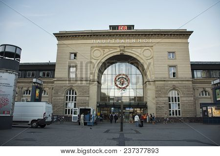 German People And Foreigner Travelers Walking In And Out Of Building Go To Train At Mannheim Hauptba